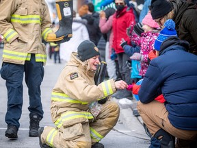 The Help Santa Toy Parade kicked off at City Hall and made its way along Laurier, turning left on Bank Street, and wrapping up at Lansdowne Park, Saturday, Nov. 19, 2022.