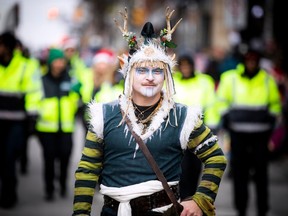 The Help Santa Toy Parade kicked off at City Hall and made its way along Laurier, turning left on Bank Street, and wrapping up at Lansdowne Park, Saturday, Nov. 19, 2022.