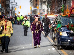 The Help Santa Toy Parade kicked off at City Hall and made its way along Laurier, turning left on Bank Street, and wrapping up at Lansdowne Park, Saturday, Nov. 19, 2022.