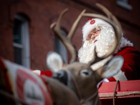 The Help Santa Toy Parade kicked off at City Hall and made its way along Laurier, turning left on Bank Street, and wrapping up at Lansdowne Park, Saturday, Nov. 19, 2022. The big guy in red was the final float, bringing loads of cheer from his big red sleigh.