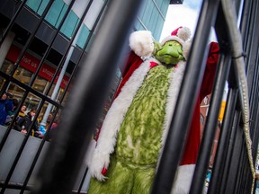 The Help Santa Toy Parade kicked off at City Hall and made its way along Laurier, turning left on Bank Street, and wrapping up at Lansdowne Park, Saturday, Nov. 19, 2022.
