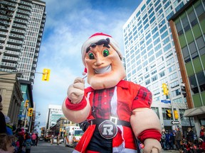 The Help Santa Toy Parade kicked off at City Hall and made its way along Laurier, turning left on Bank Street, and wrapping up at Lansdowne Park, Saturday, Nov. 19, 2022.