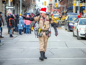 The Help Santa Toy Parade kicked off at City Hall and made its way along Laurier, turning left on Bank Street, and wrapping up at Lansdowne Park, Saturday, Nov. 19, 2022.