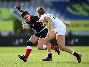 Alysha Corrigan of Canada looks to evade the defence during Rugby World Cup 2021 Semifinal match between Canada and England at Eden Park on November 05, 2022, in Auckland, New Zealand.