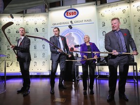 Left to right: Daniel Sedin, Roberto Luongo, Bernice Carnegie (accepting for her deceased father Herb Carnegie) and Daniel Alfredsson attend a press opportunity for their Hall induction at the Hockey Hall of Fame in Toronto, Nov. 11, 2022.