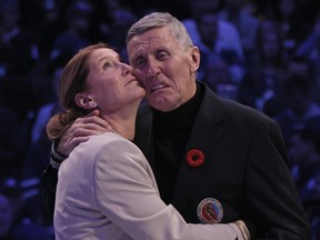Former Toronto Maple Leaf Borje Salming is honoured during a pregame ceremony prior to the game between the Toronto Maple Leafs at the Scotiabank Arena in Toronto, Nov. 11, 2022. Salming, joined with his wife Pia, was diagnosed with ALS earlier this year.