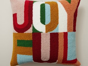 Get cozy with festive pillows.
