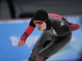 Connor Howe of Canada competes during the men's speedskating 1,000-meter finals at the 2022 Winter Olympics, Friday, Feb. 18, 2022, in Beijing. Canada's Connor Howe earned silver and Isabelle Weidemann took bronze on Friday in the first day of international speedskating competition of the 2022-23 season.