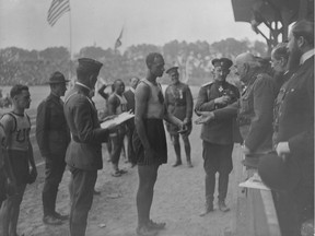John 'Army' Howard being decorated by the King of Montenegro at the Inter Allied Games at the Pershing Stadium in Paris, July 1919.