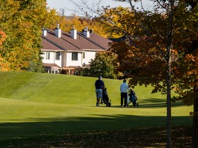 Golfers play at Kanata Golf and Country Club. Robert Campeau approached the City of Kanata decades ago offering 40-per-cent green space in Kanata North, including maintaining the golf course, in return for increased zoning density in other areas in the then-embryonic City Official Plan.
