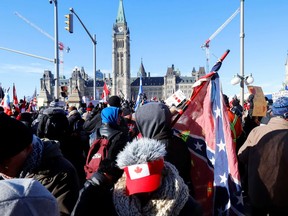 A Confederate flag is seen during the Freedom Convoy protest in Ottawa on January 29, 2022. A lawyer for the protest organizers wants executives from public affairs firm Enterprise Canada to testify at the Public Order Emergency Commission about the sighting of a Nazi and a Confederate flag during the protest.