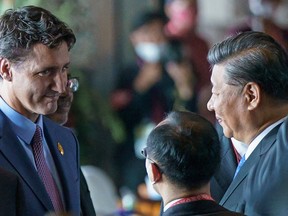 Canada's Prime Minister Justin Trudeau speaks with China's President Xi Jinping at the G20 Leaders' Summit in Bali, Indonesia, November 15, 2022. Adam Scotti/Prime Minister's Office/Handout via REUTERS.