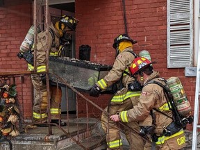 Firefighters located a boa constrictor on the second floor while battling a blaze on Monday afternoon. Firefighters safely removed the snake.