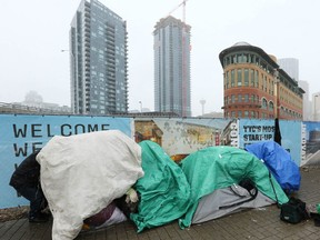 A group of tents are set up on Riverfront Avenue in Calgary on Nov. 1.
