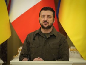 Ukrainian President Volodymyr Zelenskyy attends a news conference with Canadian Prime Minister Justin Trudeau after their meeting in Kyiv, Ukraine, Sunday, May 8, 2022. Zelenskyy is calling on Canada to help on a long-term peace plan with Russia.