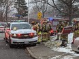 Firefighters at the scene of a fire on Gladstone Ave., Saturday.