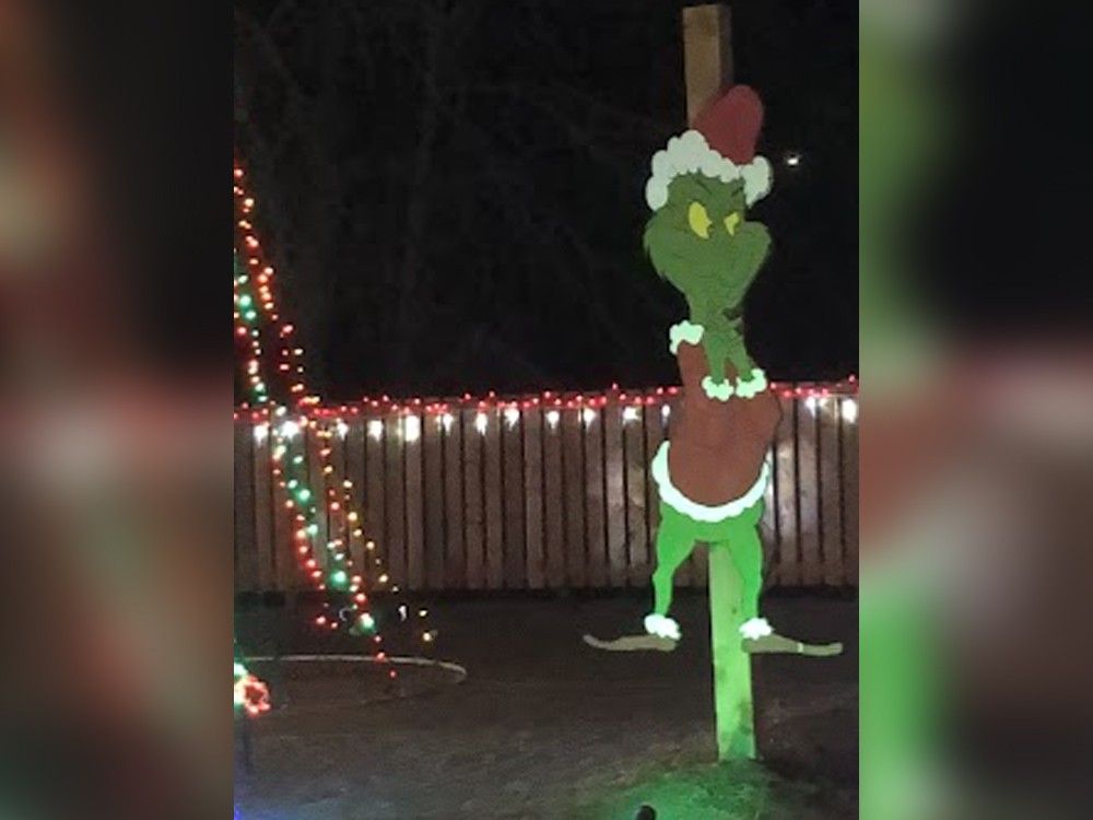grinch pulling christmas lights down