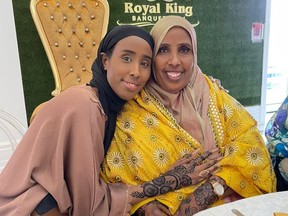 A file photo shows Hodan Hashi, left, and her mother, Anab Hirsi, at a family wedding in Toronto.