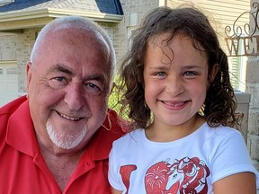 Com. Allan Hubley wonders how his six-year-old granddaughter Macara will react when she sees Mark Sutcliffe with the office chain.