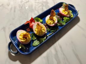 Deviled eggs with crispy chicken skin at Parlour on Wellington Street West