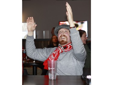 Fans gather at Hometown Sports Grill in Ottawa Wednesday to cheer on Canada.