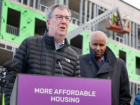 Ottawa Mayor Jim Watson and federal Housing Minister Ahmed Hussen made the housing announcement Monday at Wateridge Village.