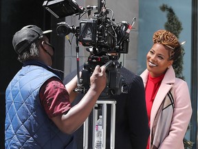 Eva Marcille on set while filming "A Christmas Fumble” on Queen Street in early July, 2022. Tony Caldwell/Postmedia