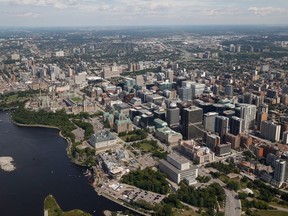 View of Parliament Hill and the City of Ottawa from a helicopter.