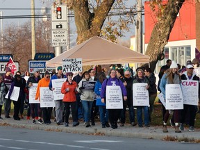 Education workers gathered at picket lines across Ottawa Friday morning to express their dissatisfaction with the province forcing a contract on members of the Canadian Union of Public Employees. Tony Caldwell/Postmedia