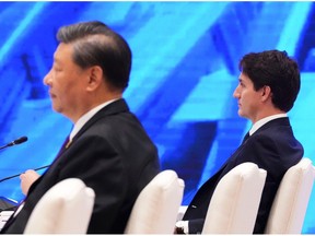 Justin Trudeau and Xi Jinping participates in the APEC Leaders' Retreat I on balanced, inclusive and sustainable growth at the APEC summit in Bangkok on Nov. 18.