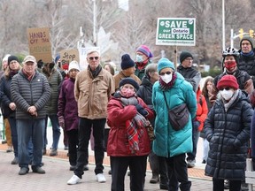 Protesters gathered at Ottawa City Hall on Tuesday to voice their opposition to new provincial housing legislation.