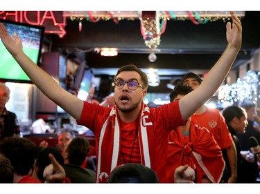 Josh Geauvreau reacts to a call. Canadian soccer fans were going crazy at the Glebe Central Pub Wednesday afternoon as Canada played Belgium in the World Cup.