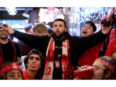 Aaron Hooper reacts to a call while cheering on Canada at the Glebe Central Pub Wednesday afternoon.
