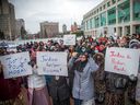 Thousands of people gathered outside Ottawa City Hall on Saturday afternoon to hold a rally in memory of 23-year-old Hodan Hashi, who was murdered in Saskatoon on November 5.