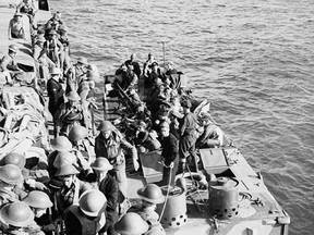 Troops of the Cameron Highlanders of Canada in landing craft prior to the raid on Dieppe. Of the 4,963 Canadians who embarked from England for the operation, only 2,210 returned, and many of these were wounded.