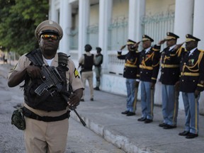A soldier of the Haitian Armed Forces stands guard during a ceremony to mark the 219th anniversary of the Battle of Vertieres, the last major battle of Haitian independence from France in 1803, in Port-au-Prince, Haiti November 18, 2022.