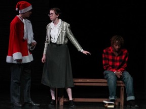 Clinton Cochran played by Alex Wehbe (L), Melita Linton played by Miles Houghton (M), and Ewart Rokosh played by Benjamin Shimwa (R) at St Paul High School’s Cappies production of the Schoolhouse on December 9, 2022.