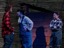 Ewart Rokosh played by Benjamin Shimwa (L), Russell Yellowlees played by Jaden Croucher, and played by Kealey Lahey (R) at St Paul High School's Cappies production of the Schoolhouse on Dec. 9, 2022.