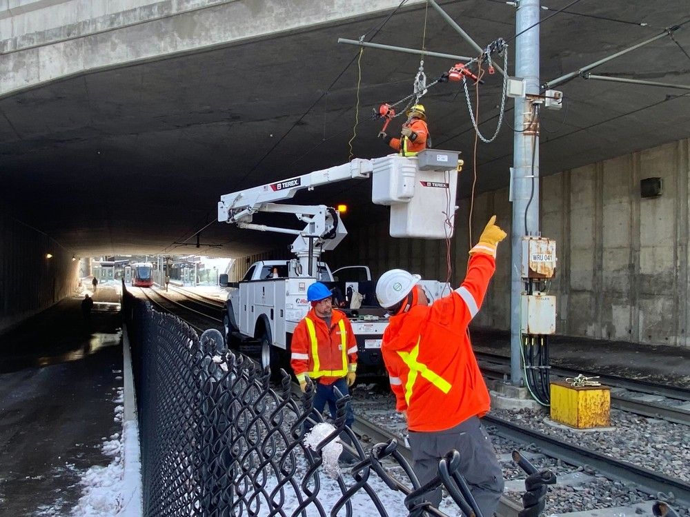 Transpo workers at a mechanical failure to part of the overhead catenary system,  FILE PHOTO