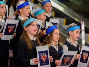The Calgary Jewish school choir performs at the community Menorah lighting, Dec. 19.
