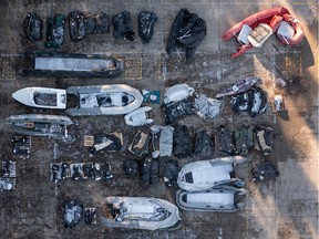DOVER, ENGLAND - DECEMBER 15: Inflatable craft and boat engines used by migrants to cross the channel are stored in a Home Office facility on December 15, 2022 in Dover, England. Four people died, and 39 were rescued, after a packed boat with migrants sank in the English Channel yesterday. A search continues for four more people believed to be missing.