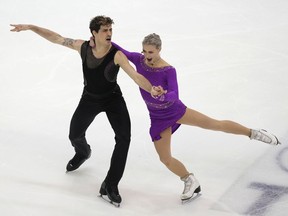 Canada's Piper Gilles and Paul Poirier compete during the Ice Dance Rhythm Dance at the figure skating Grand Prix finals at the Palavela ice arena, in Turin, Italy, Friday, Dec. 9, 2022.