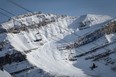 A skier catches a lift on the Summit chair at Lake Louise ski resort in Banff National Park on Saturday, December 10, 2022. AL CHAREST / POSTMEDIA