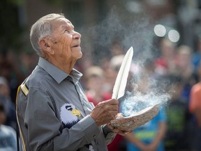 Elder Eric Issac performs a smudging ceremony in Windsor, Ont. in 2018. A recent Charter challenge attempted to ban this practice from B.C. schools on the grounds that it was imposing religion on the student body.