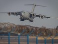 A C-17 Globemaster cargo plane lands at Rzeszow-Jasionka Airport, south eastern Poland, on Feb. 16, 2022.