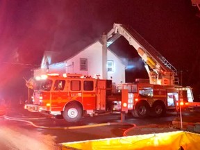 Ottawa Fire Services fights a house fire on Yorks Corners Road early Thursday.