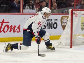 Washington Capitals left wing Alex Ovechkin (8) sets up for a shot in front of the Ottawa Senators net in the second period at the Canadian Tire Centre, Dec. 22, 2022.