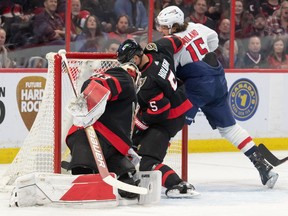 Washington Capitals left wing Sonny Milano (15) scores against Ottawa Senators goalie Cam Talbot (33) in the second period at the Canadian Tire Centre, Dec. 22, 2022.