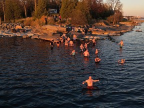A group of cold water swimmers plunged into Lake Ontario in Kingston for five minutes in December as part of the Kingston Wim Hof December Challenge. The group is hoping to gather at least 40 participants to set a world record on Jan. 1, 2023, for the most people swimming in ice water while laughing.