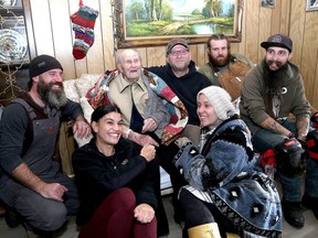 Members of Veterans on Wheels with 99-year-old Second World War veteran Jan Jemiolo. From left are: Tom Murphy, Carla Chisholm, Jemiolo, Scott MacPherson, Jordyn Murphy, Jake Spinney and Jamie Gallant. The group is fixing up Jemiolo's home.